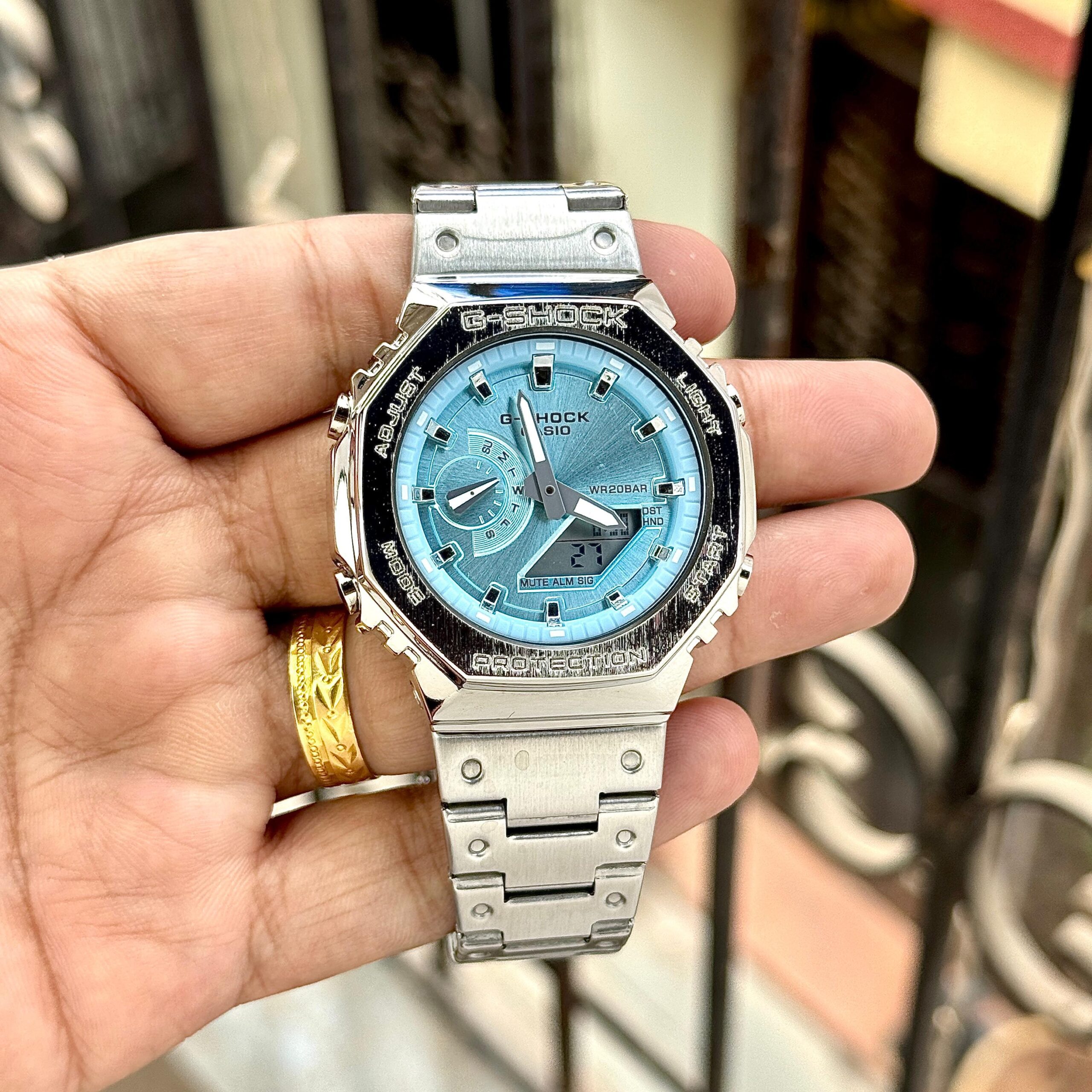 2c04c33f-e19c-4678-9ce1-2c96a2b1000b Casio G-Shock “CasiOak” – Ice Blue Dial Stainless Steel Analog-Digital Watch - Image 1