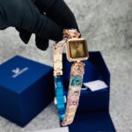Swarovski Luxe Square Dial Ladies Watch – Champagne Gold Multicolor Crystal Edition